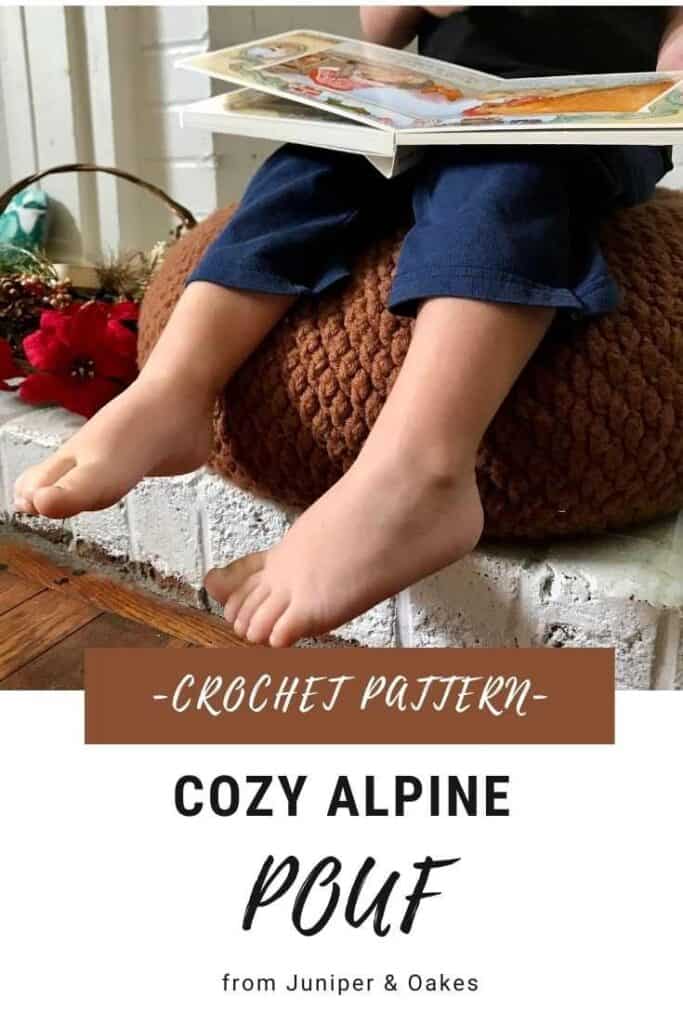 Child sitting on a plush crochet pouf reading a book, showcasing the cozy and stylish design.