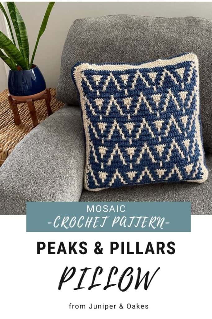 Mosaic crochet pillow with blue and white geometric pattern by Juniper & Oakes.