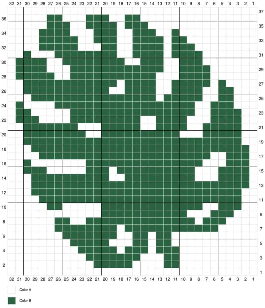 Cross-stitch pattern of a juniper branch with oaks in green and white.