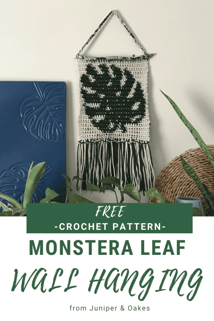 Monstera leaf crochet wall hanging with black and white design, decorative home wall art.
