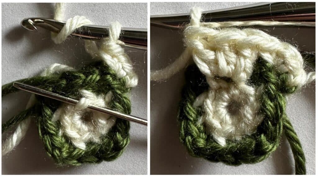 Close-up of green and white crochet stitches on metal hook.