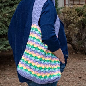 Colorful crochet shell tote bag for summer outings.
