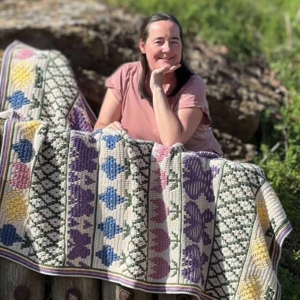 Outdoor blanket with colorful patterns and textures.