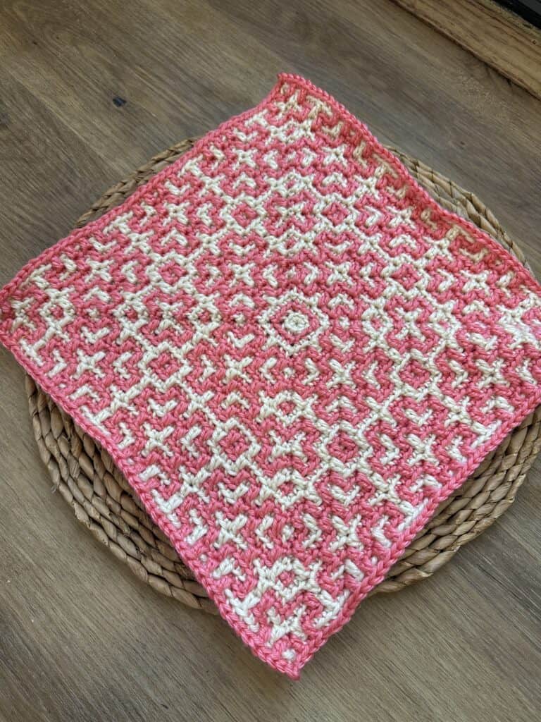 Detailed Celtic knot mosaic crochet square in pink and white. Perfect for quilting or decorative pro.