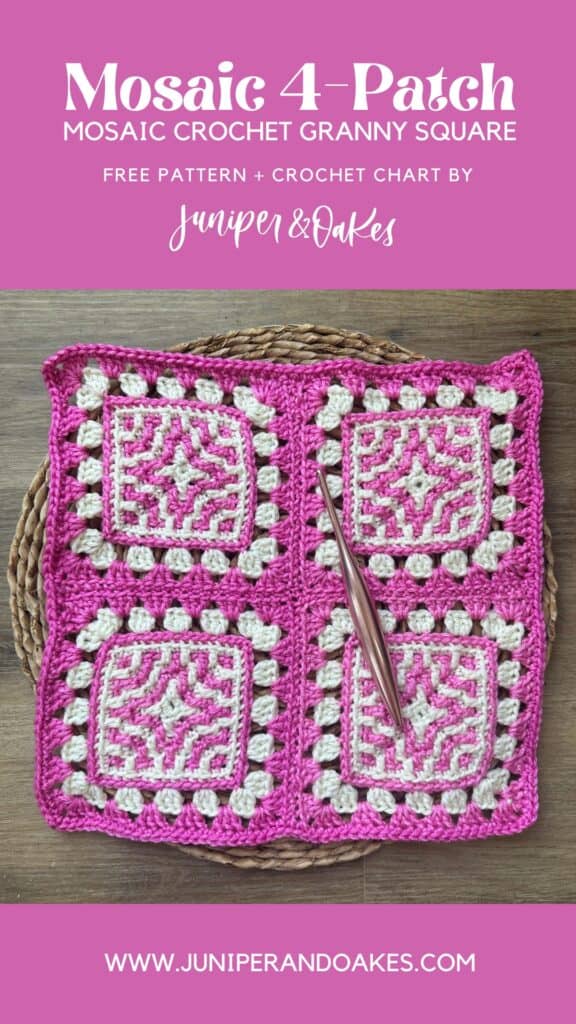 Pink and white mosaic crochet granny square pattern for a 4-patch design, with crochet hook on woode.