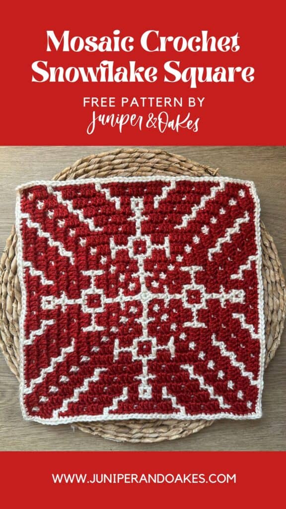 Mosaic crochet snowflake square with red and white yarn, detailed pattern.