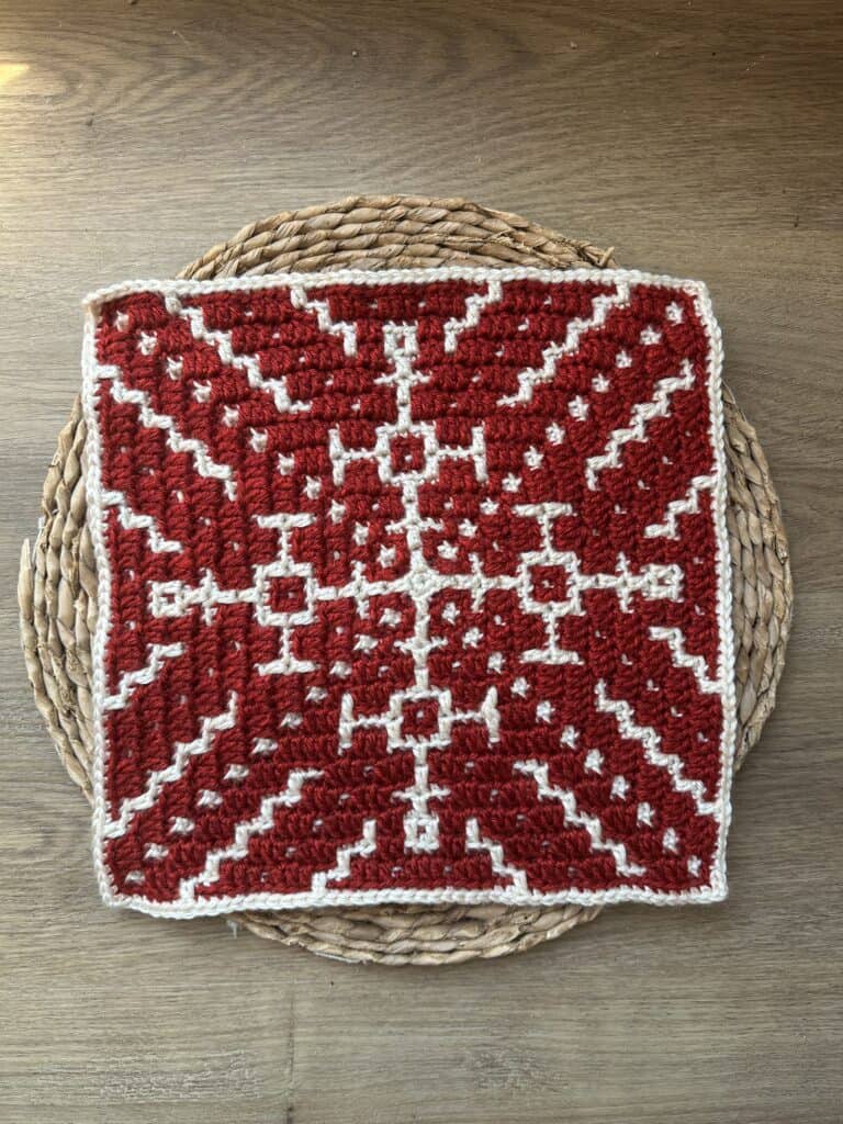 Crochet snowflake square pattern in red and white for mosaic crochet projects.