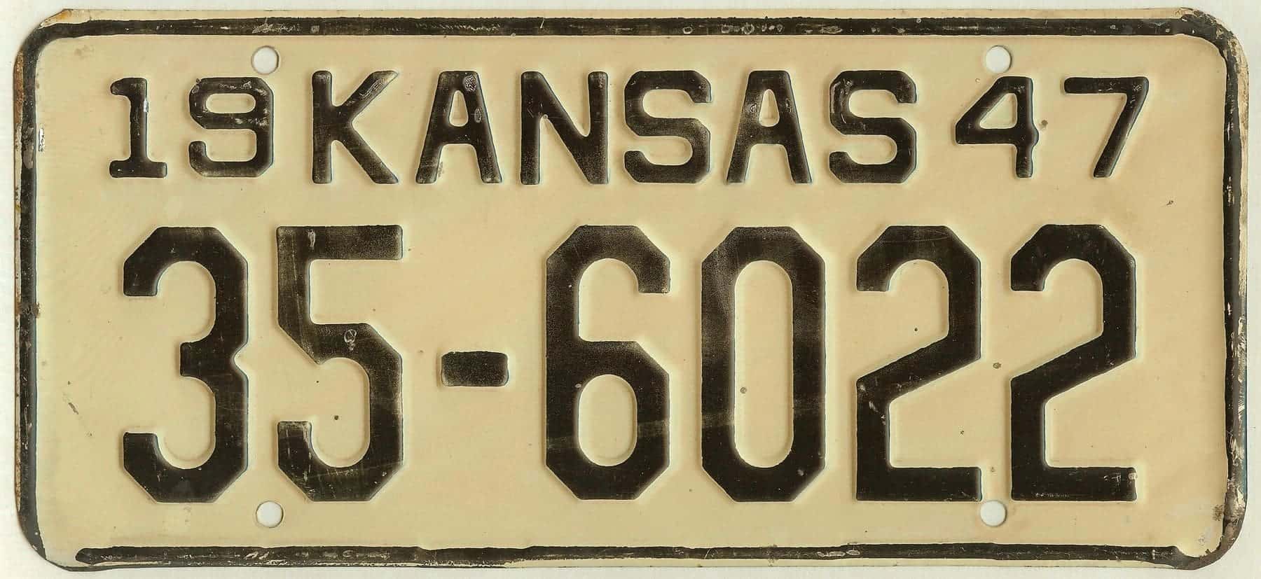 Kansas 1947 car license plate Ford county #35-6022