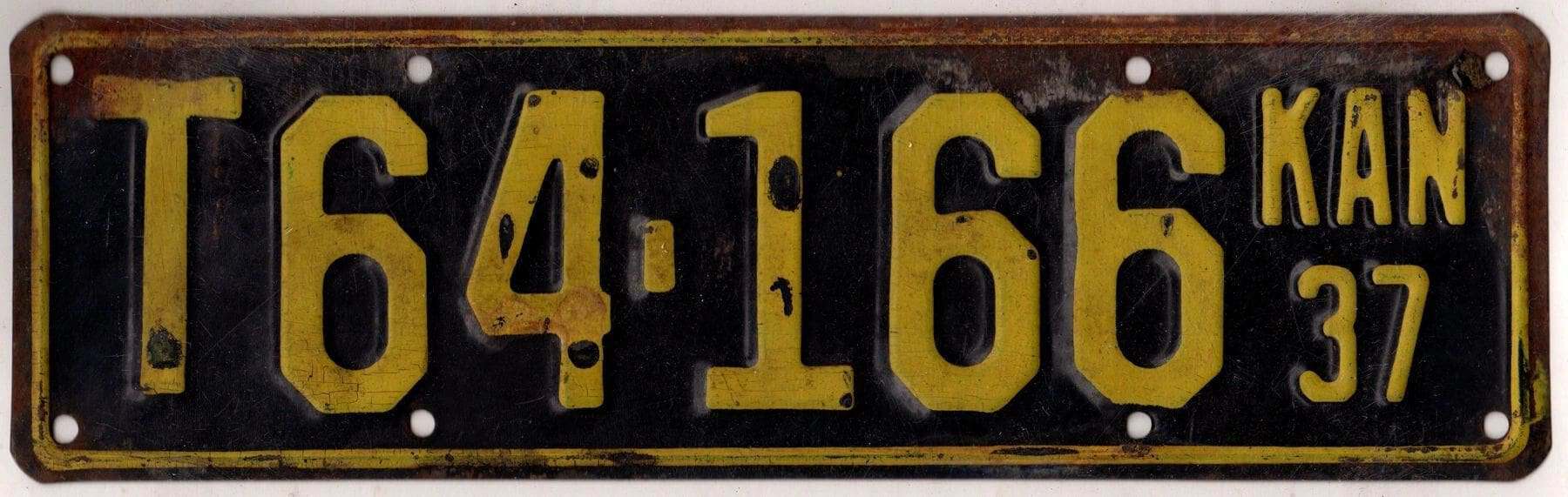 Kansas 1937 truck license plate Ellsworth county #T64-166