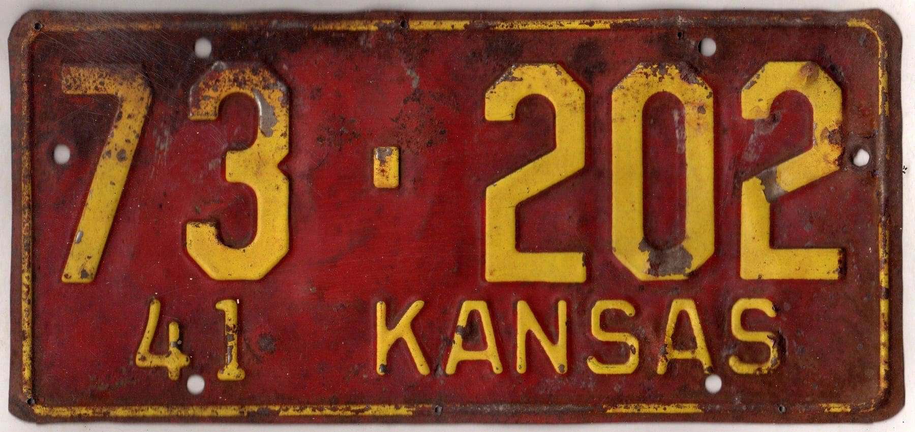 Kansas 1941 car license plate Rush county #73-202