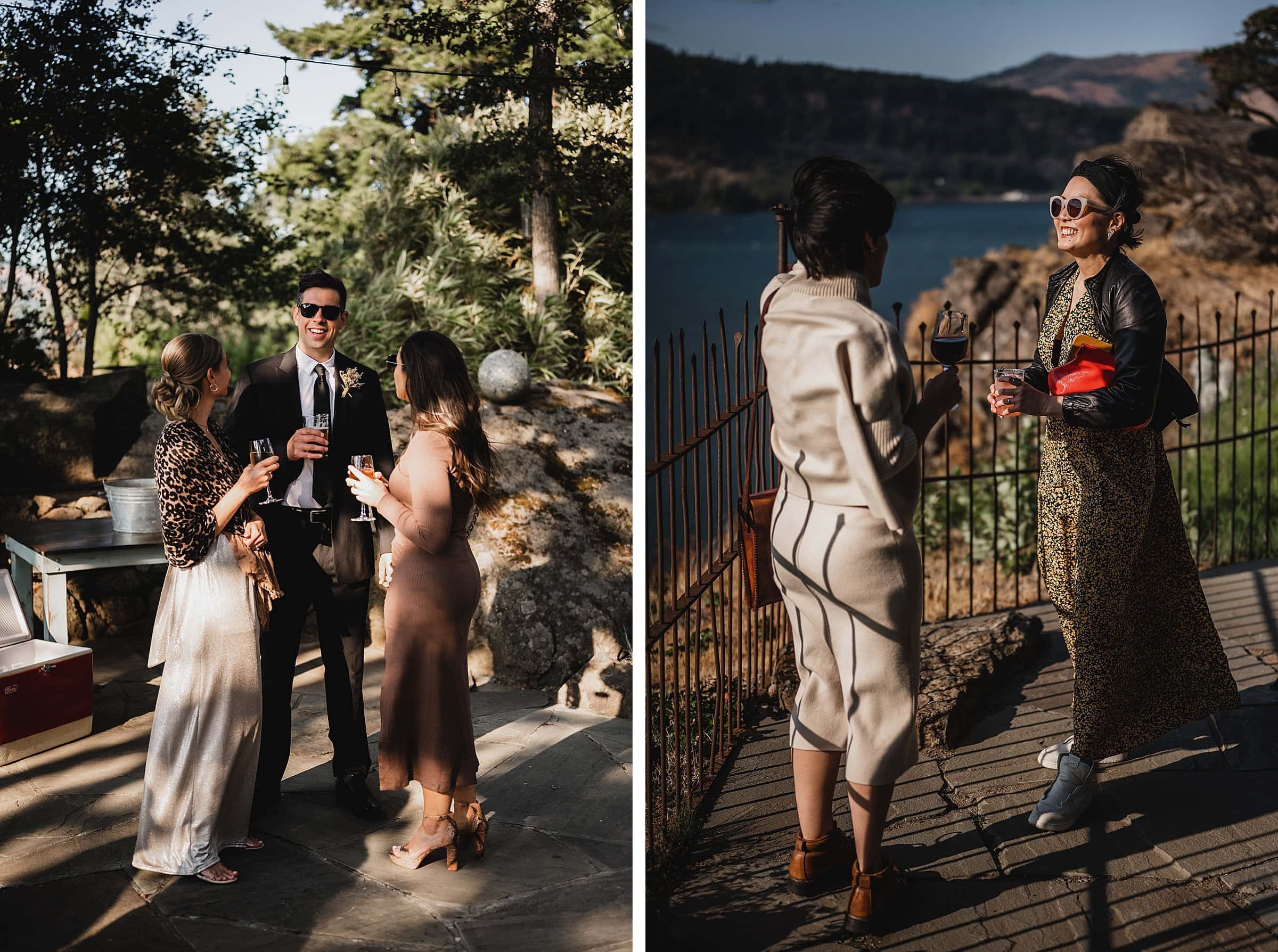 Two groups of people engage in lively conversation outdoors, some in formal attire and others casually dressed, set against the scenic backdrop of wedding photos at The Griffin House.