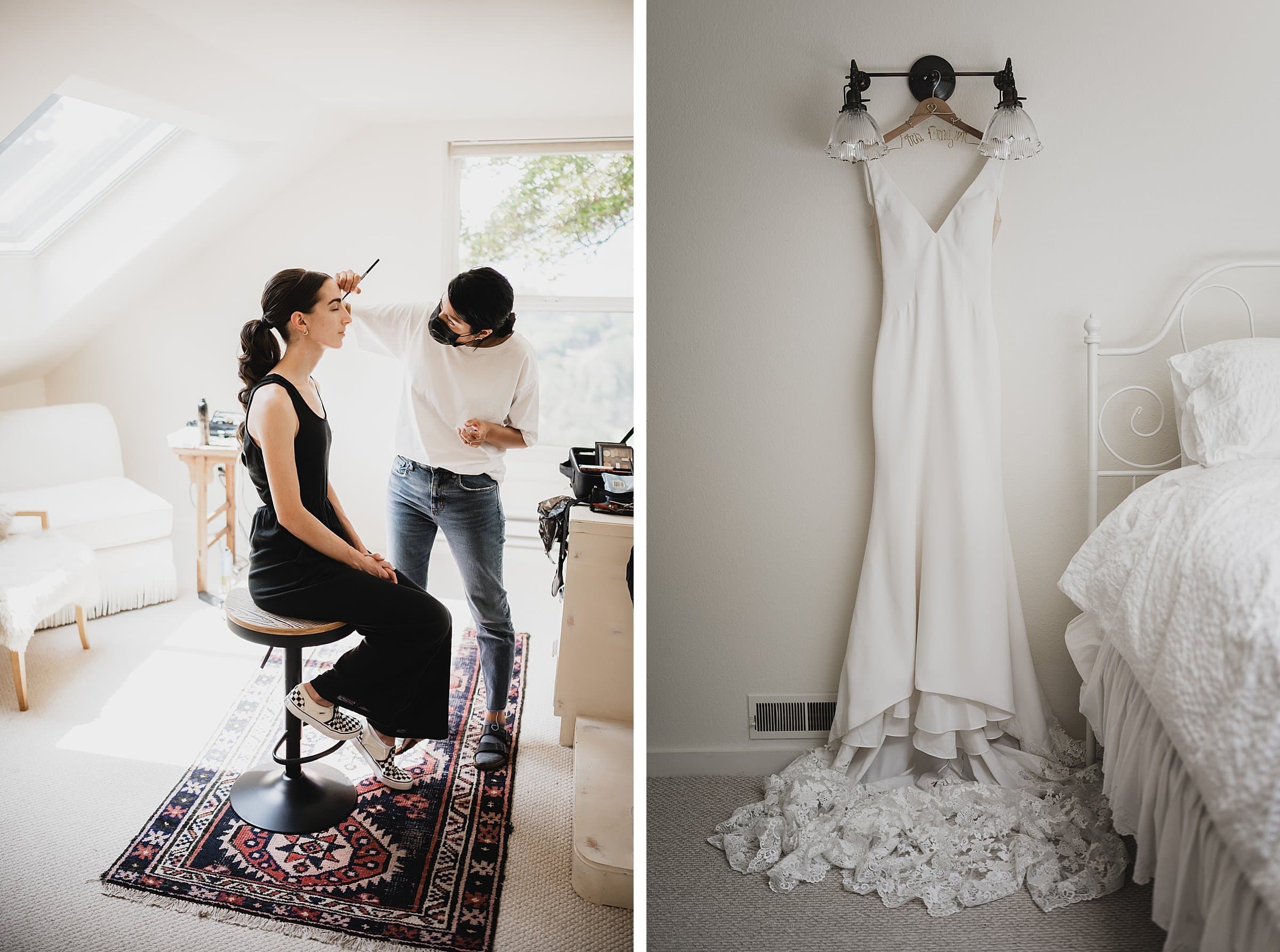 A woman gets her makeup done as a white bridal gown hangs on the wall in a softly lit room, perfect for capturing stunning wedding photos at The Griffin House.
