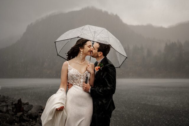 Luckily, we brought umbrellas for Katie and Nick’s elopement because the sunshine transitioned to a torrential downpour in minutes. Not that it did much good because we got soaked to the bone and only lasted about 5 minutes. But damn did it make for an epic moment as we were all cackling like maniacs given the ridiculousness of being out  in those conditions.