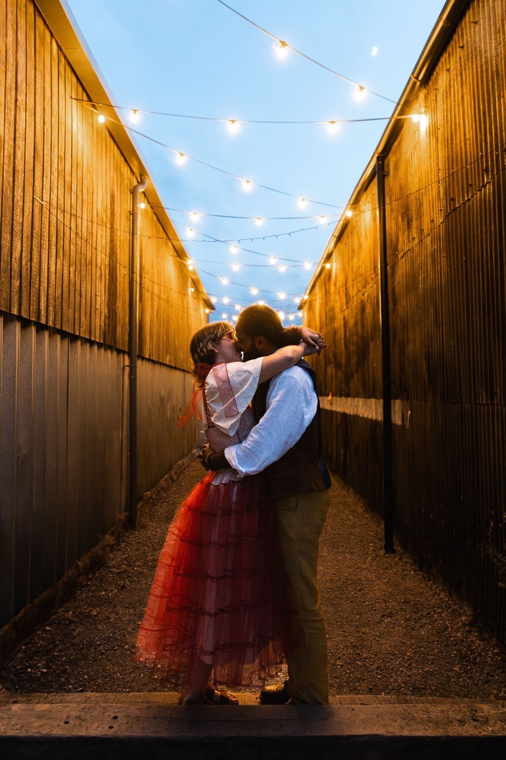 Photography of a yellow DIY wedding in a barn by London photographer Lauren Squire
