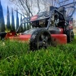 Lawn mower on a lush green lawn during fall in Tracy, CA.