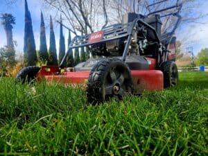 Lawn mower on a lush green lawn during fall in Tracy, CA.