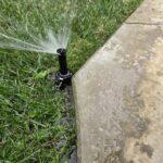 Making sure that the lawn is getting watered properly
