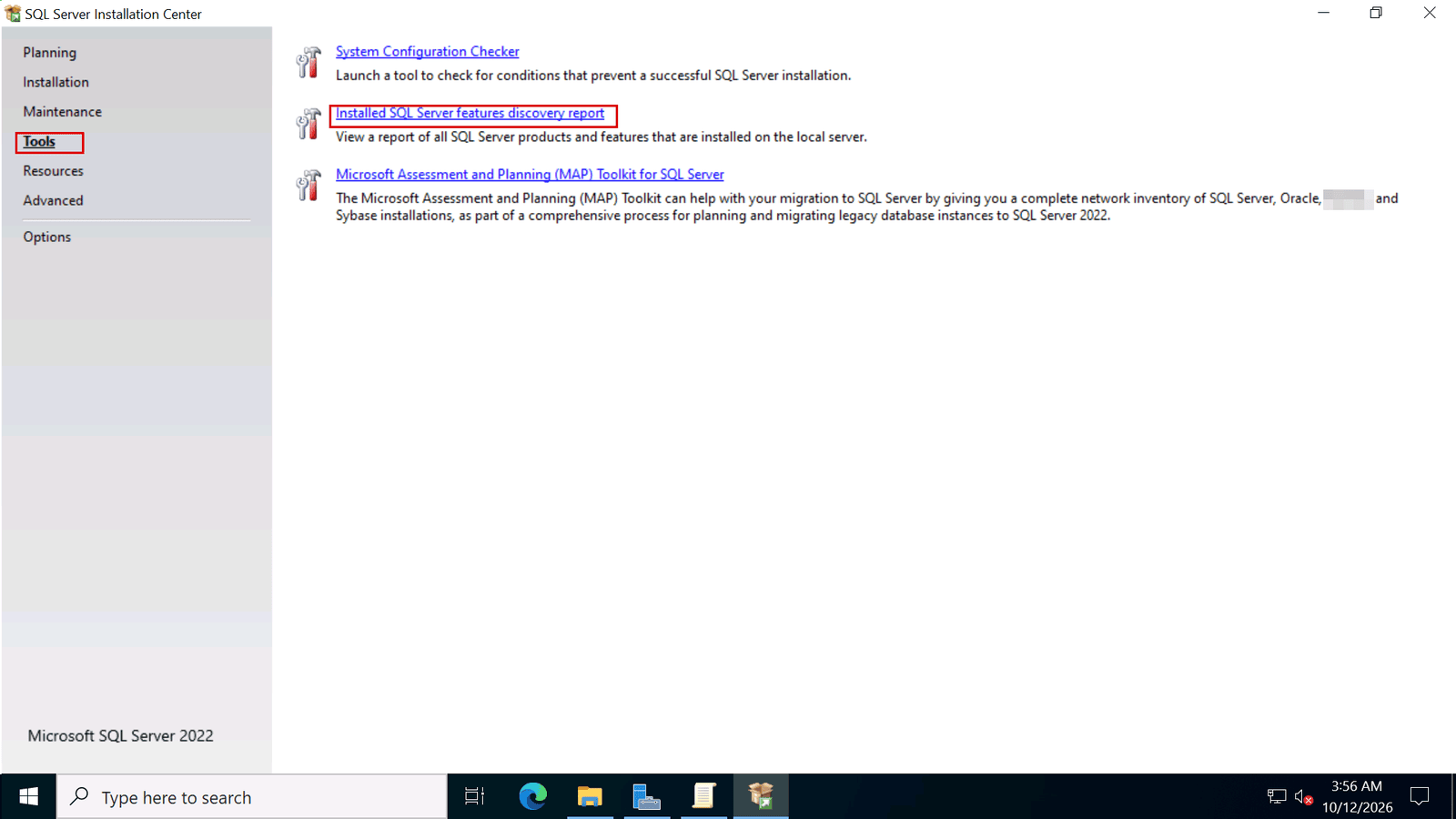 SQL Server Installation Center, Tools page, with the Installed SQL Server features discovery report link marked