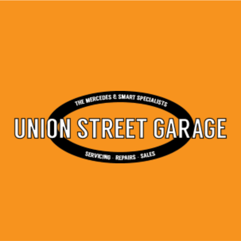 Union Street Garage logo with orange background and black oval.
