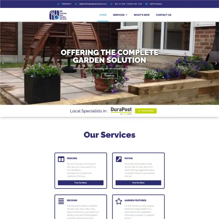 Beautiful garden with wooden decking and flower beds by Liteform.