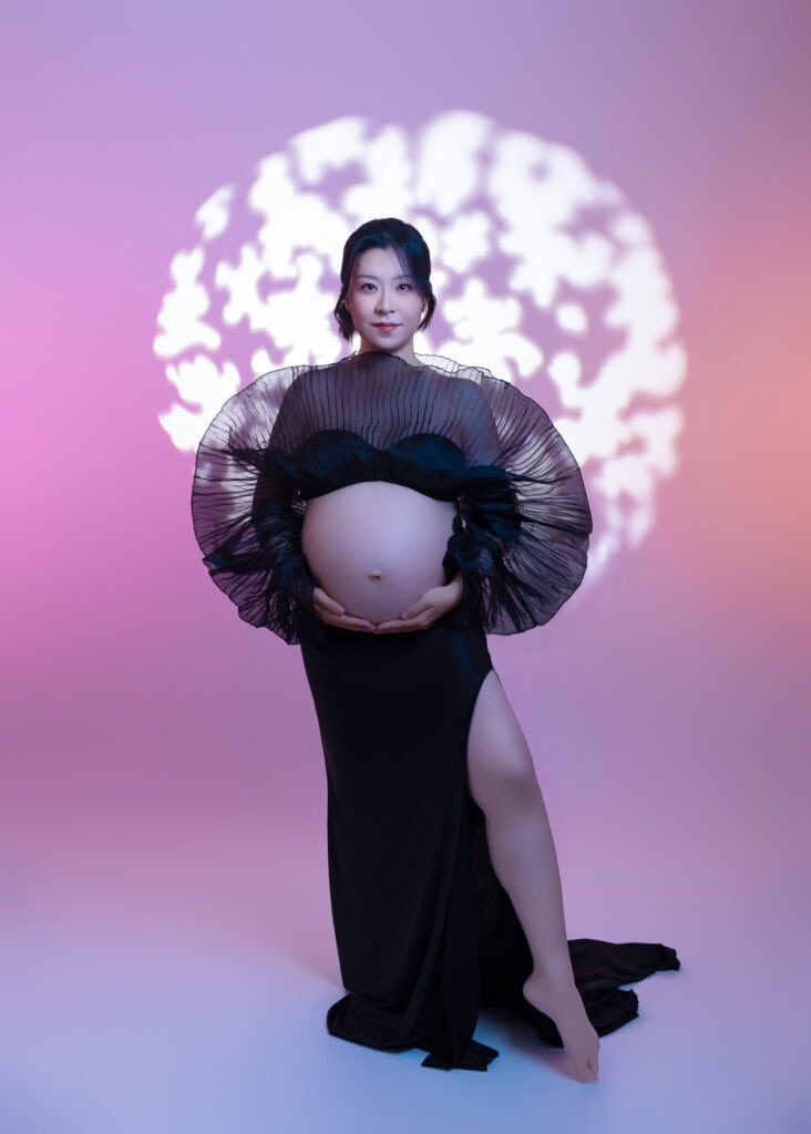 Edmonton mom taking her maternity photo with Little One Photography
