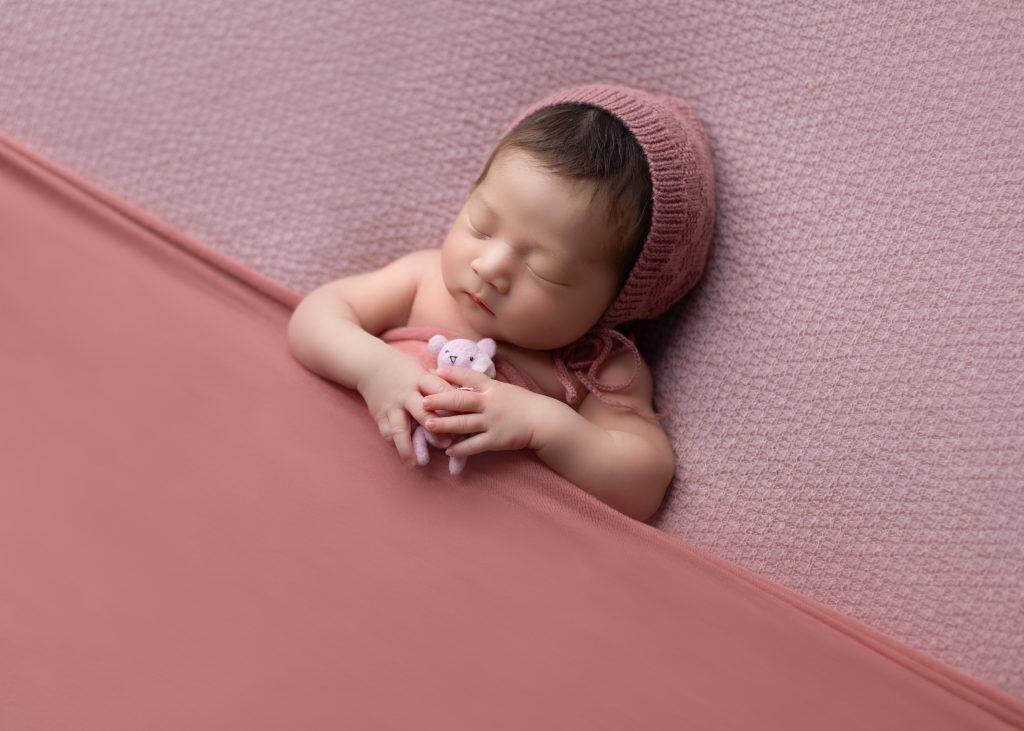 Edmonton newborn photography, baby hold pink bear