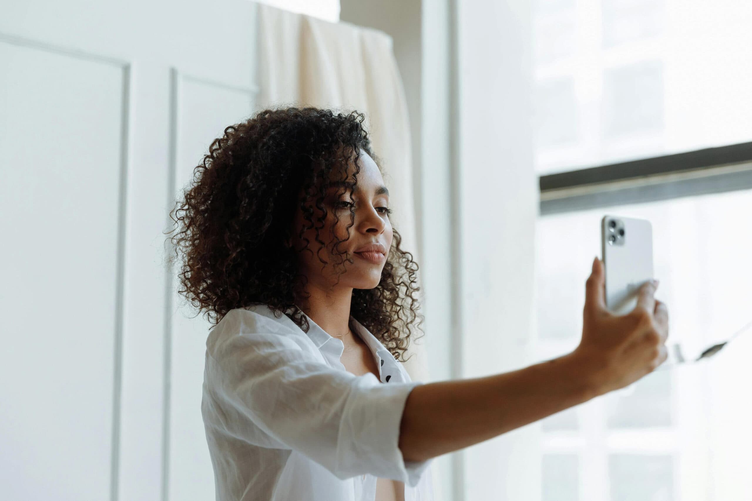 a woman taking a selfie