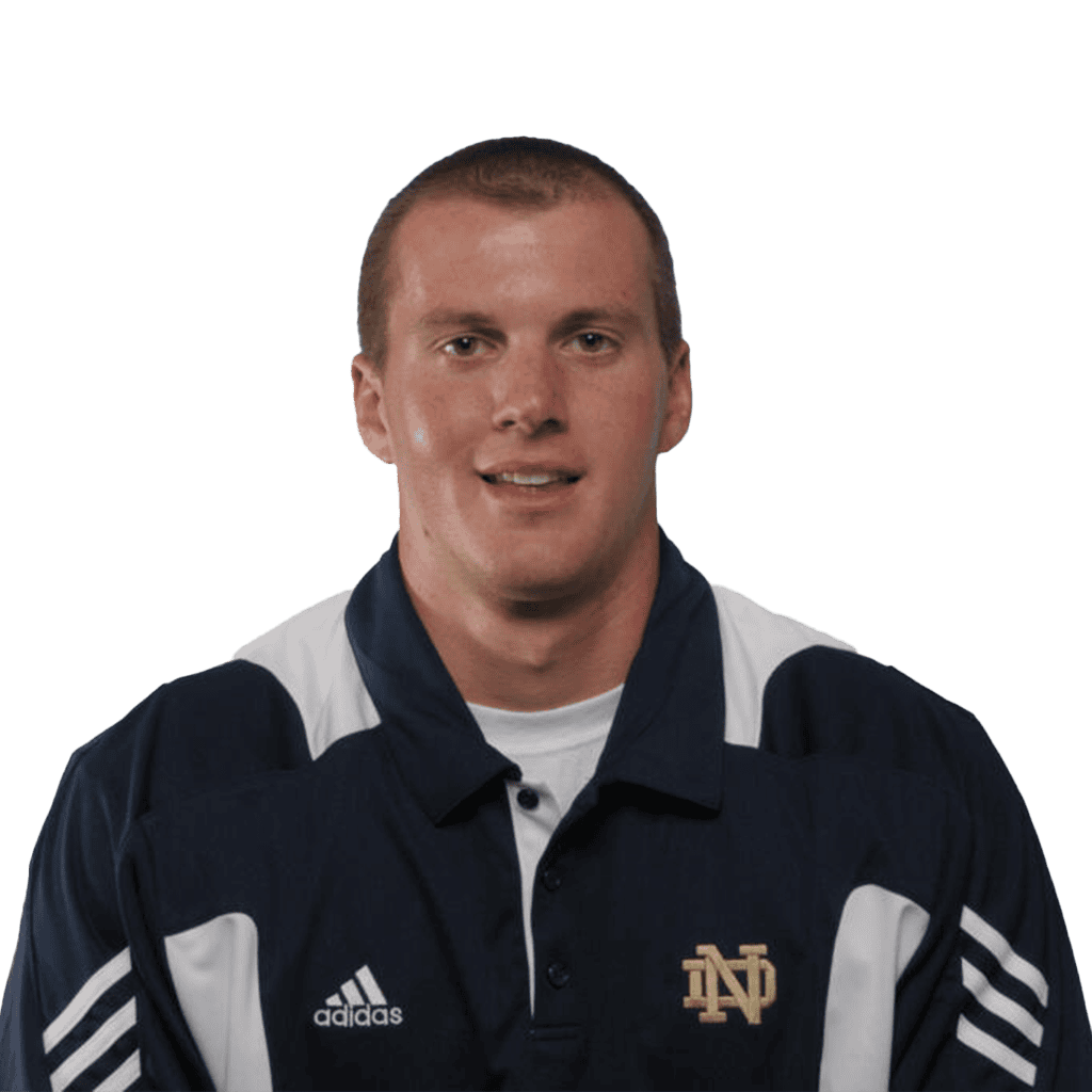 Portrait of a football player in Notre Dame uniform, smiling, for Lou Groza Award.