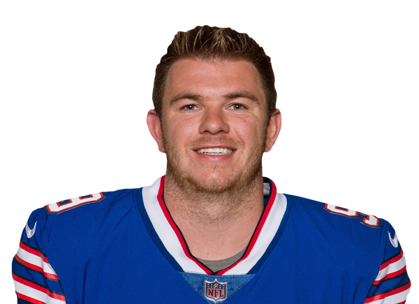 Football player in blue jersey smiling for Lou Groza Award image.