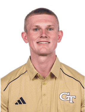 Young man in Georgia Tech shirt smiling for the camera.