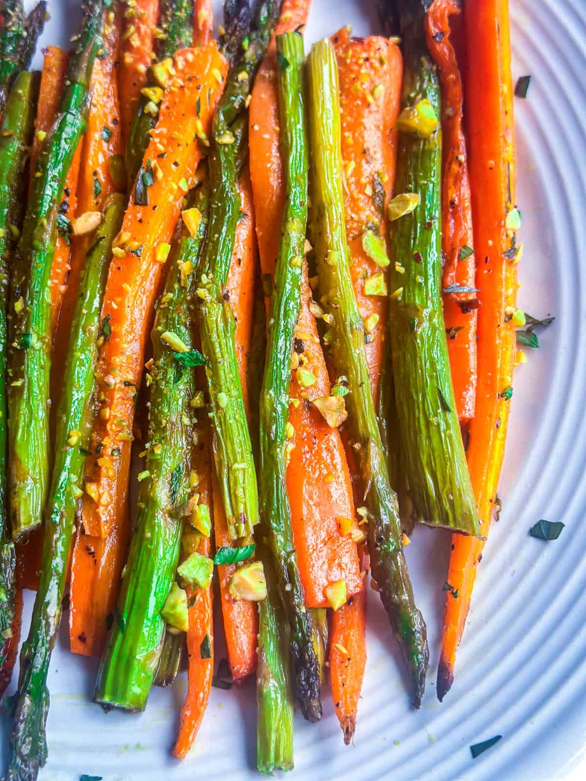 roasted carrots and asparagus close up shot