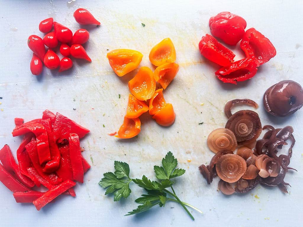 Chopped antipasti pickled peppers and onions.