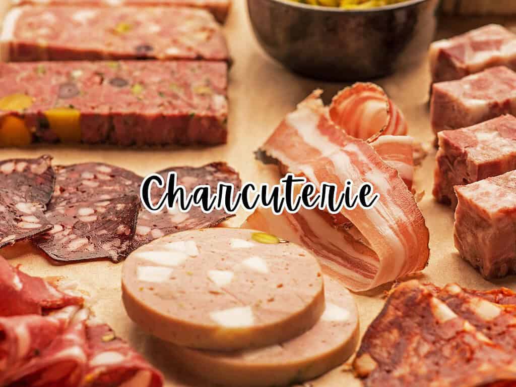 A variety of charcuterie meats, pâté, and terrines.