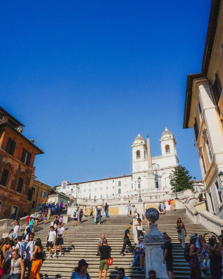 Here are the famous Spanish Steps that descend from the white washed Trinita dei Monti church and end in the busy Piazza di Spagna. These steps are quite steep surrounded by Roman classic facades on either side. You will also find many tourists on these steps taking photos or in the piazza. The Steps are located in the area of Rome called Villa Borghese, which is where you can find all the most luxurious hotels in Rome.