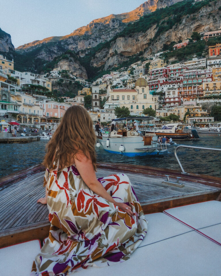 my favorite thing I did on the Amalfi Coast Italy is a sunset boat ride in Positano
