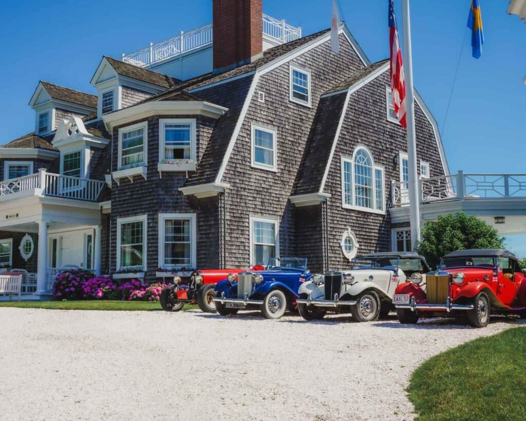 This famous house is one of the larger houses on Nantucket. It's famous for its gray shutters and white trim, and each summer you can spot the old vintage cars out front in the driveway in the colors red, white, and blue. You can find this house on Cliff Road when biking around the neighborhoods on your day trip to Nantucket.