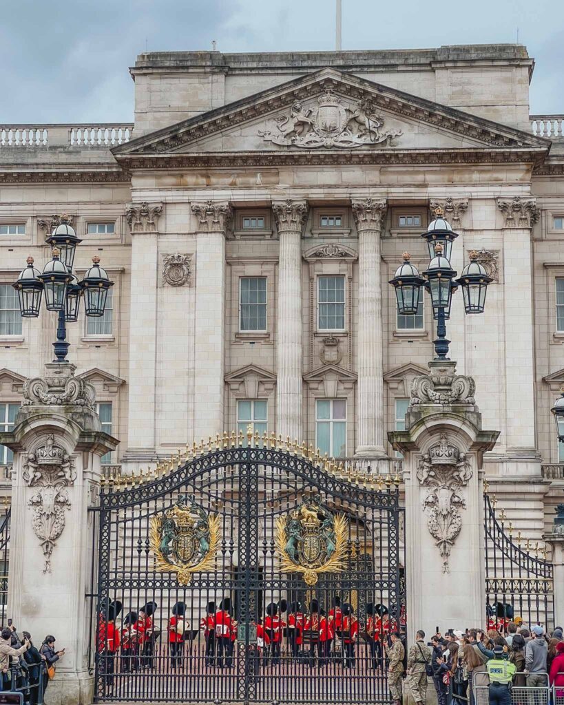 One of the most beautiful buildings in London is Buckingham Palace, especially seen with it's iconic palace guards out front.