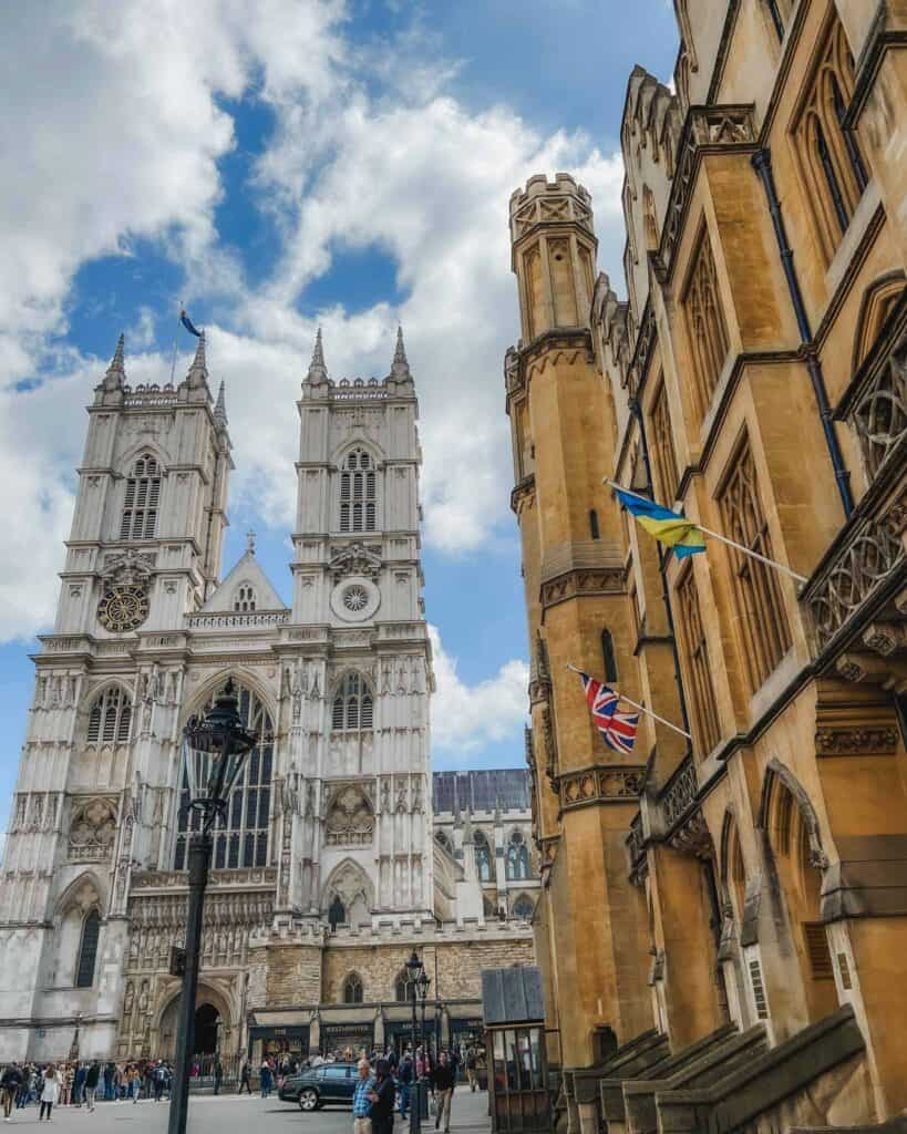Westminster Abbey shown here is an incredible example of Gothic architecture, particularly the English Gothic style. You'll find pointed arches, ribbed vaulting, and intricate stone carvings.