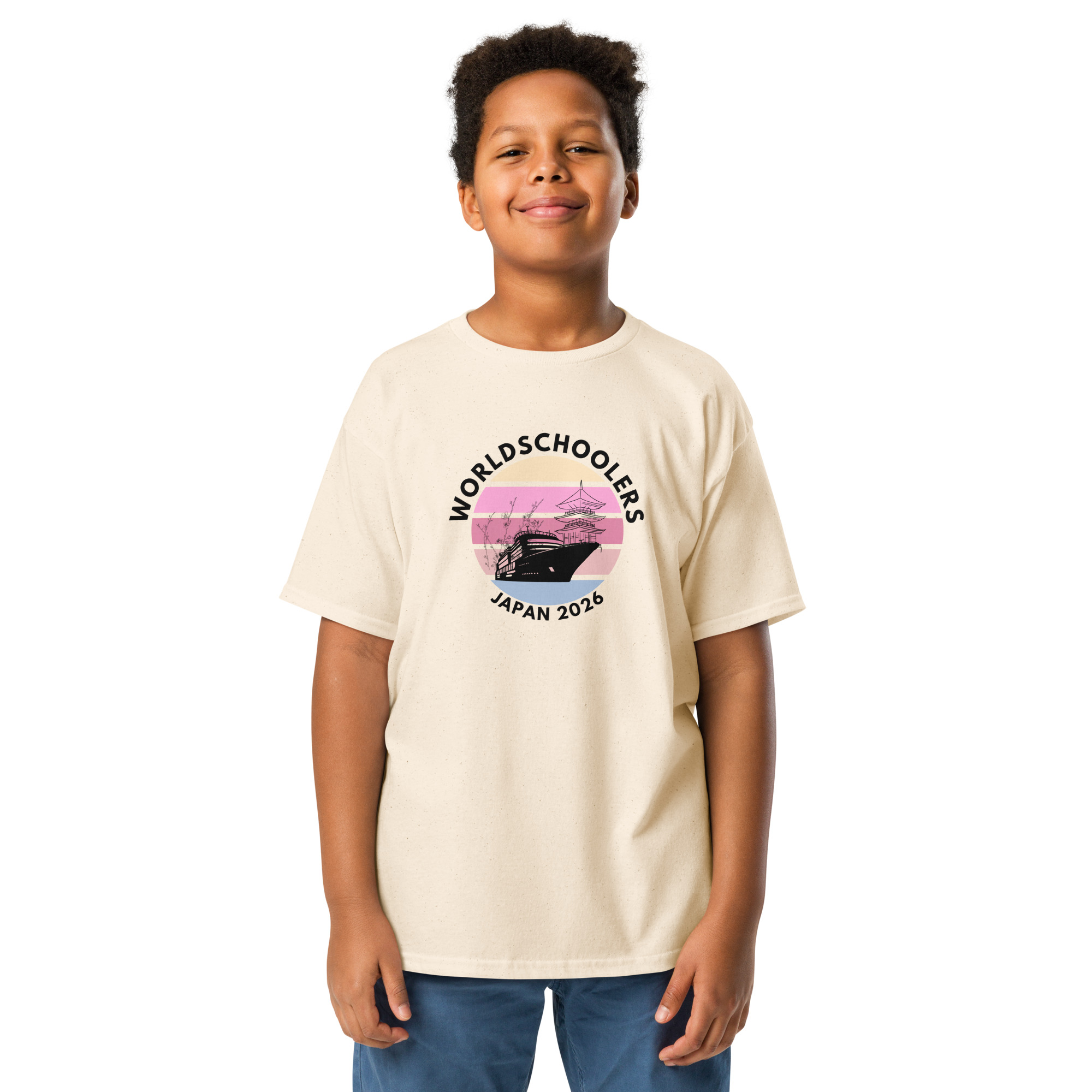 Child wearing a Japan 2026 Youth Classic Tee featuring a graphic of Mount Fuji and cherry blossoms, perfect for fans of Japan travel and youth sports events.