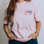 A front view of Mercy Chefs' "Love the One" t-shirt