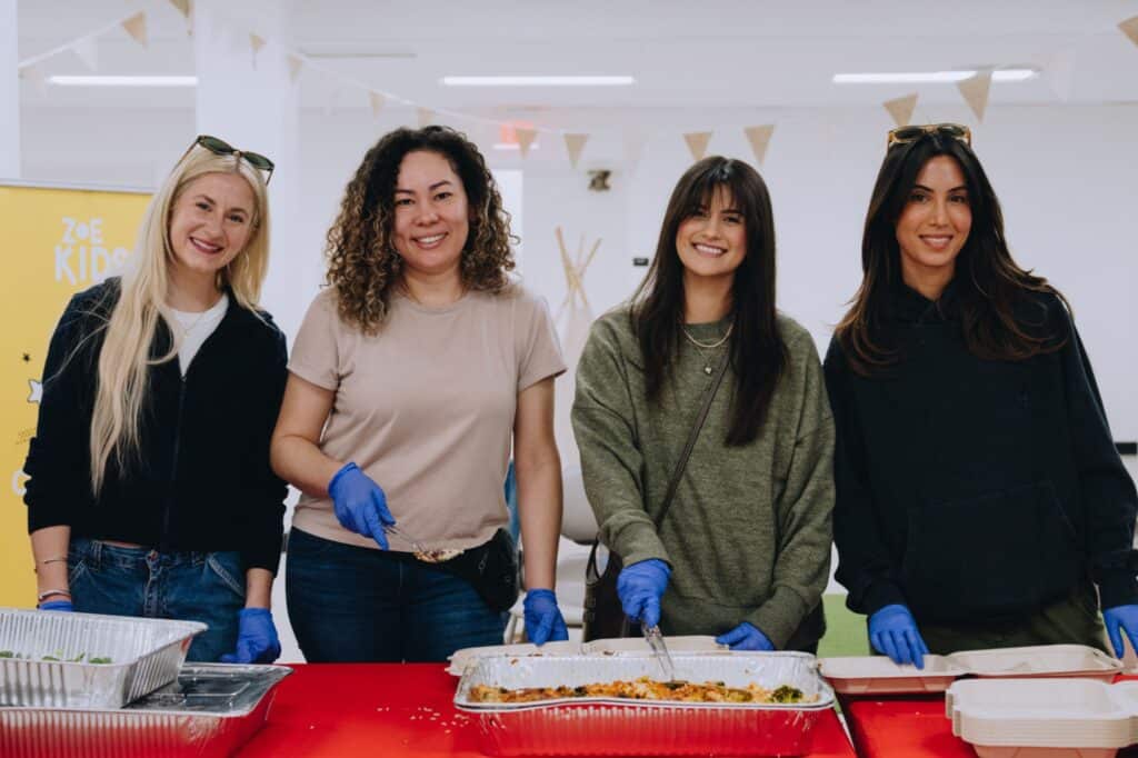 Volunteers at Zoe Church LA serving Mercy Chefs meals for LA wildfire victims.
