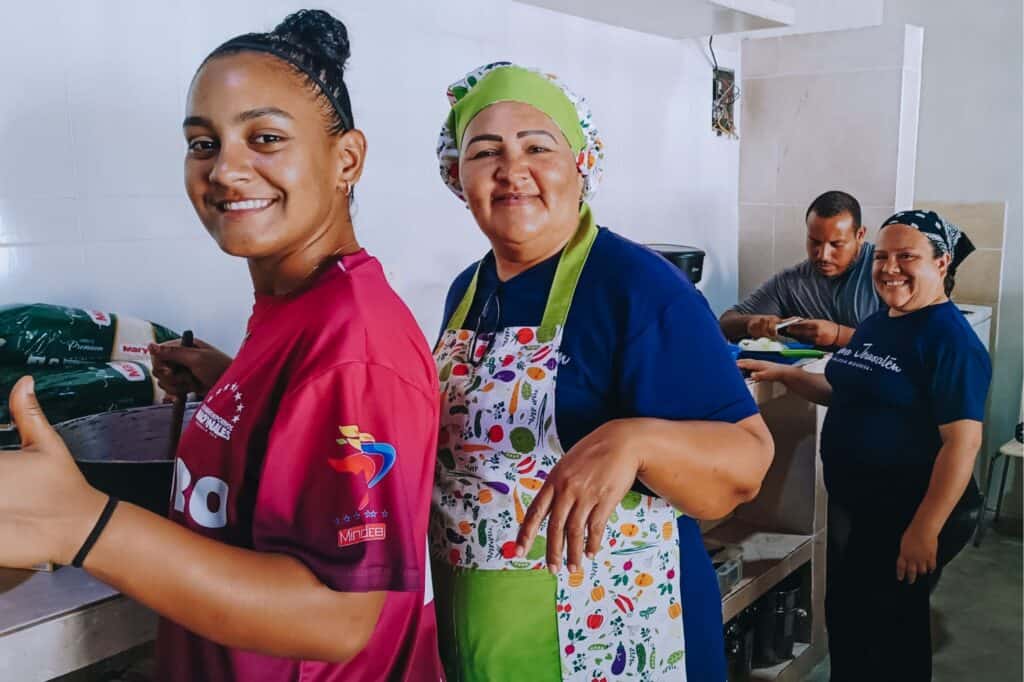 Camila and Mercy Chefs Global partners preparing meals in Venezuela
