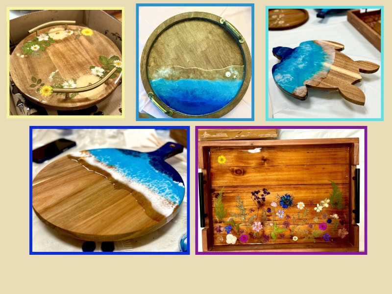 Collection of handcrafted wooden art pieces with ocean-inspired designs.