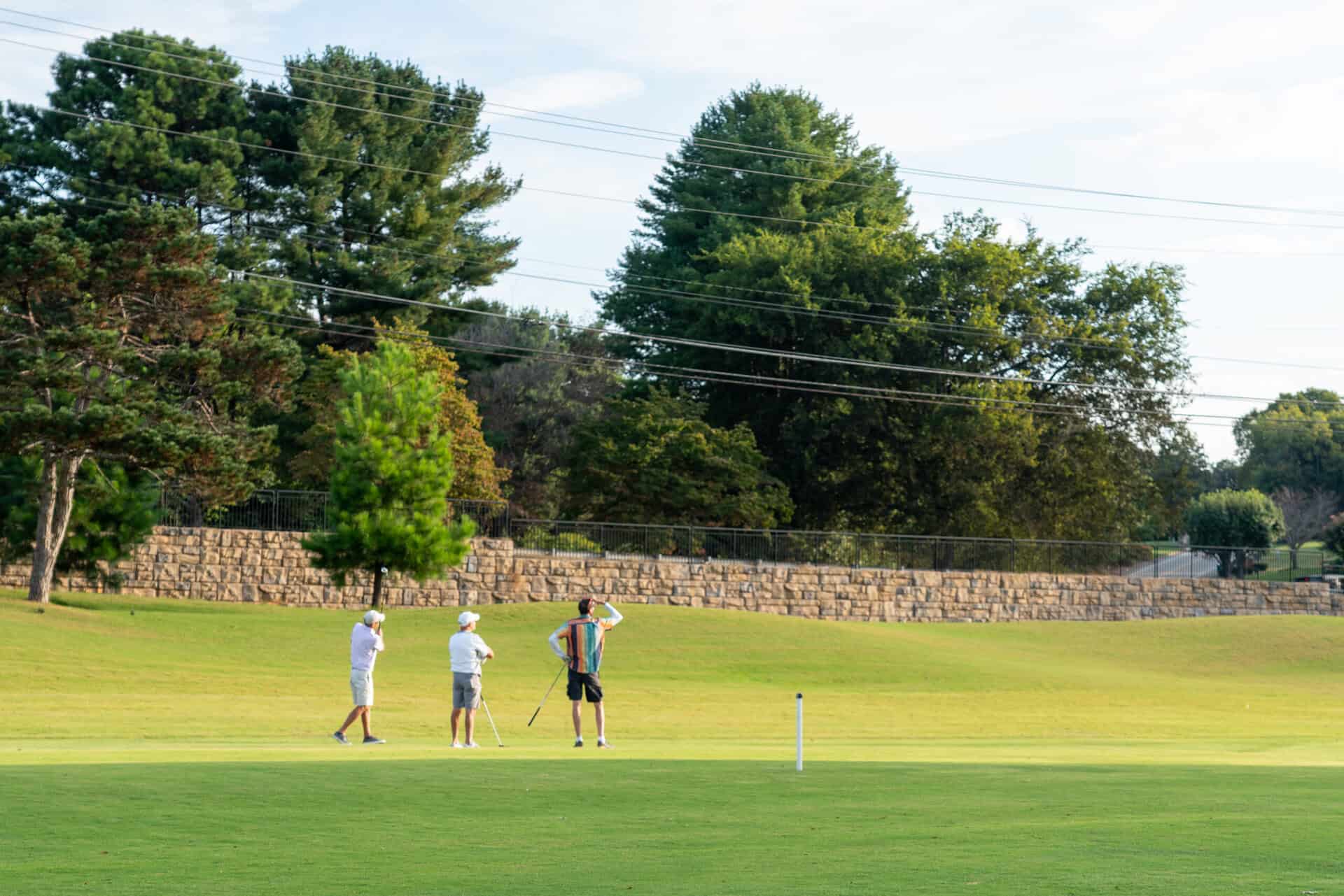 A group of people playing a game of frisbee.