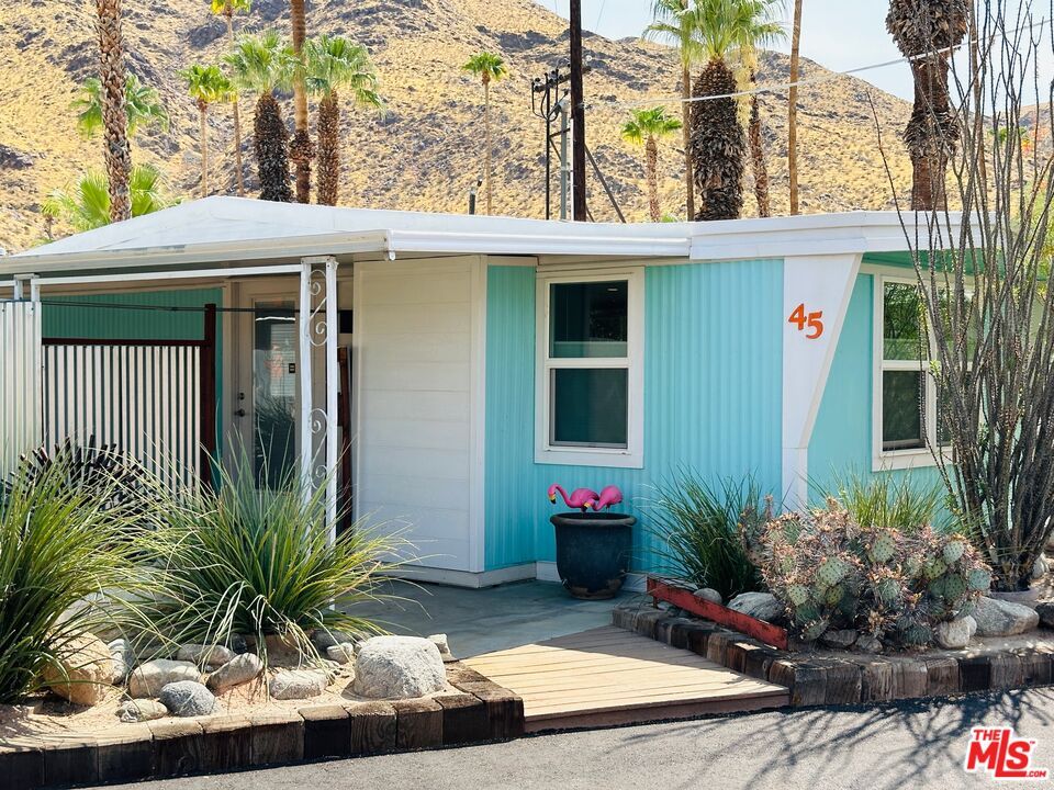 cute teal single wide mobile home