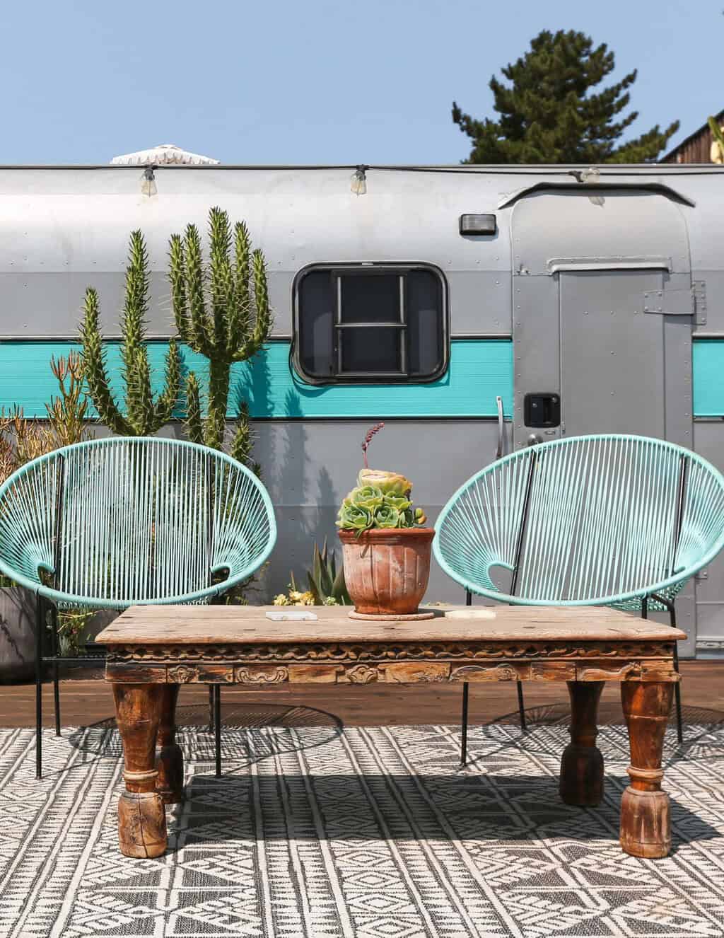 silver camper with great deck