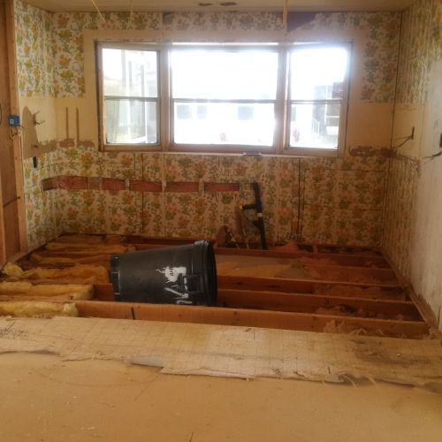 gutted kitchen during $45,000 manufactured home renovation