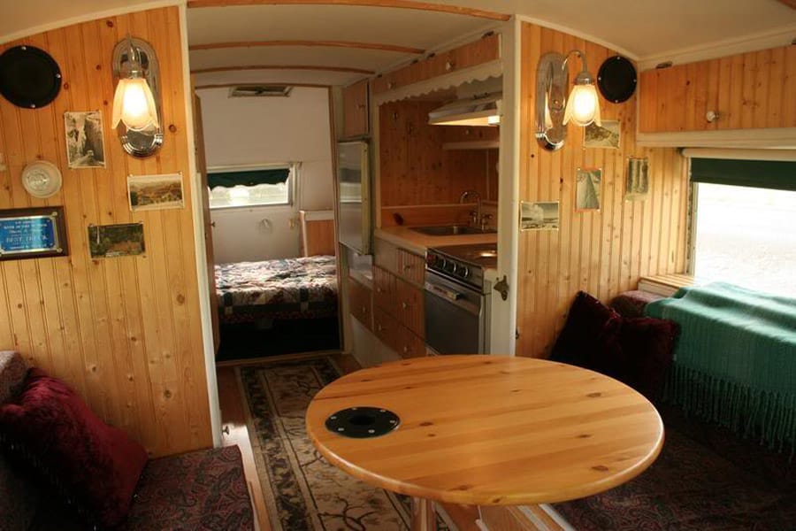 vintage buses-The Emerald Gypsy - Vintage Bus Conversions Interio Dining Area