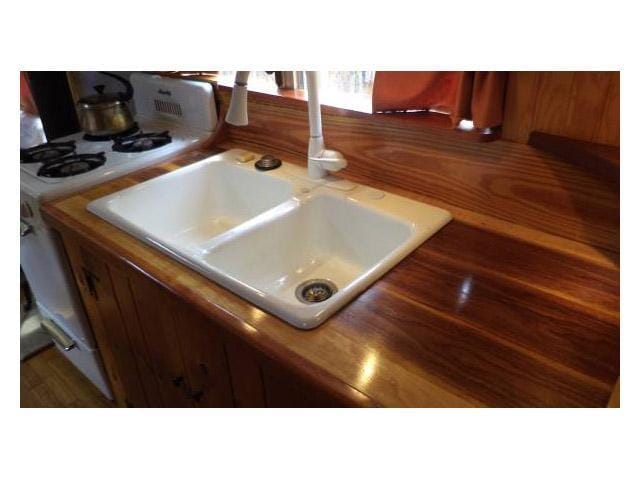 vintage buses-wood counter top in 1997 Bluebird International bus conversion