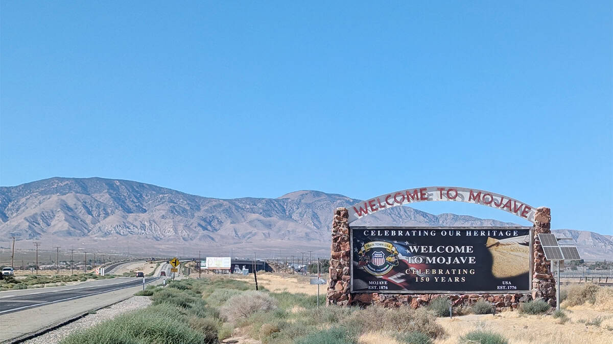 A welcome sign commemorates Mojave's 150 years.